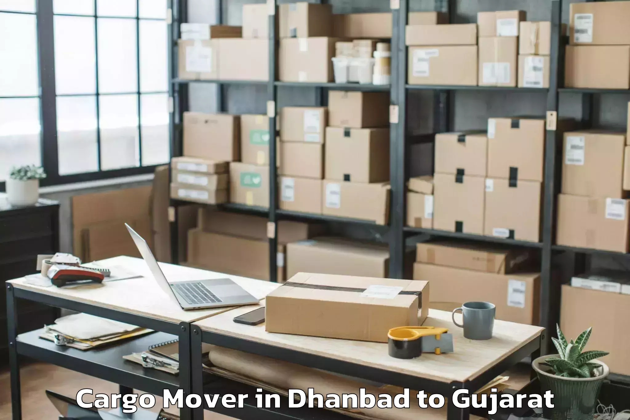 Reliable Dhanbad to Visavadar Cargo Mover